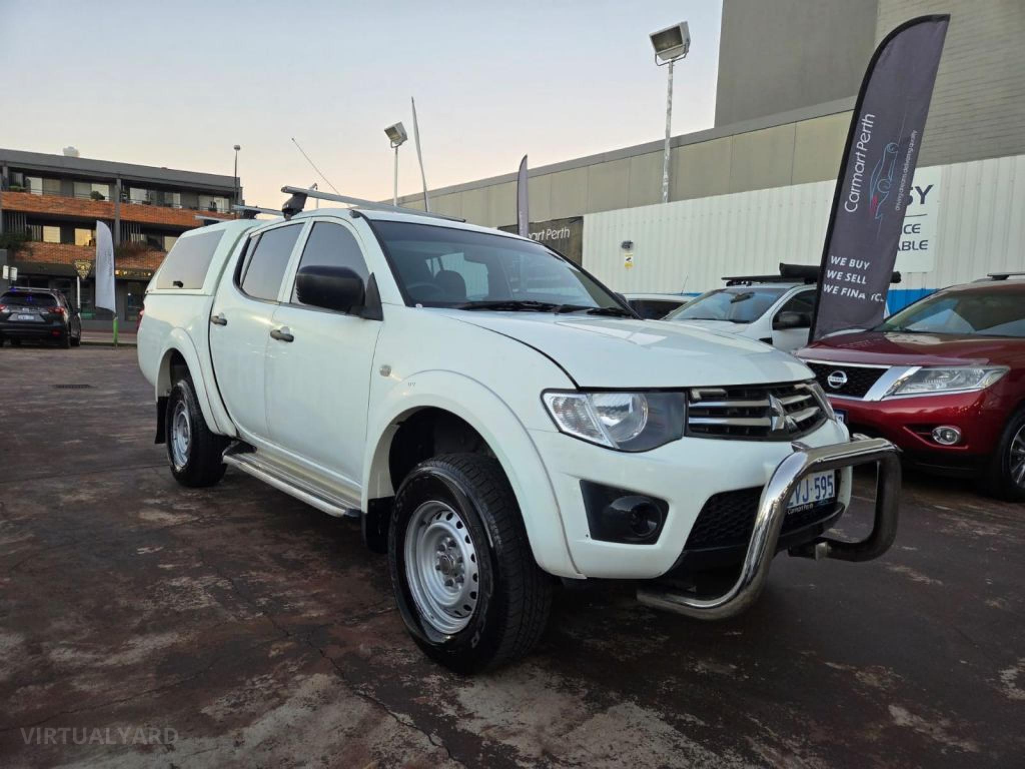 2015 Mitsubishi Triton — photo 1